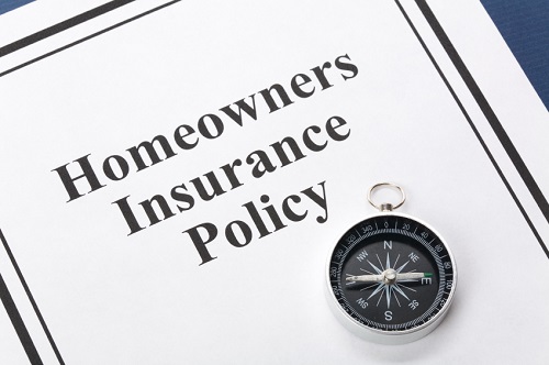 homeowner insurance policy with compass on top