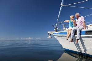 older couple sitting on a boat
